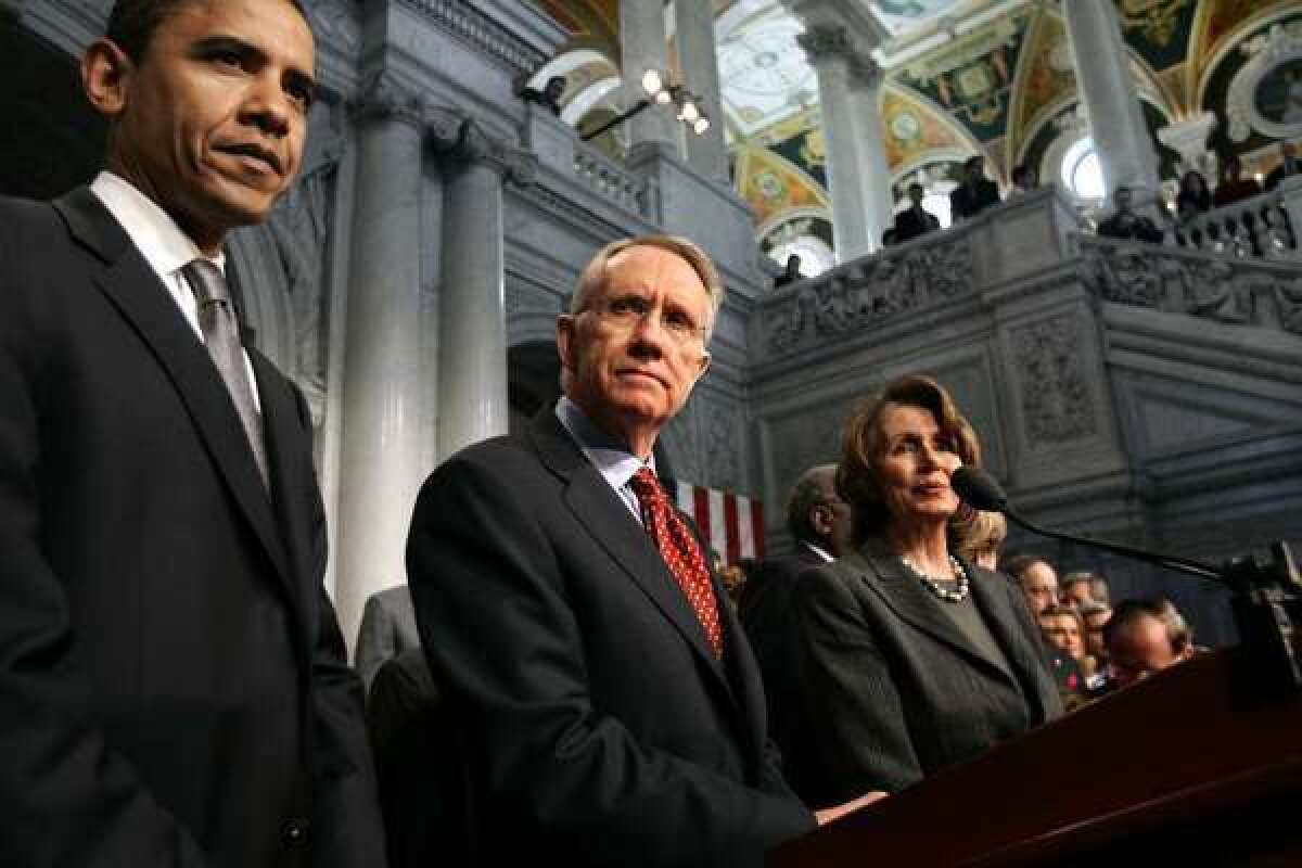 President Obama with Senate Majority Leader Harry Reid and House Minority Leader Nancy Pelosi.