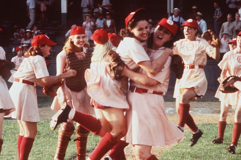 Madonna (front left) and Rosie O'Donnell (front right) star in "A League of Their Own."