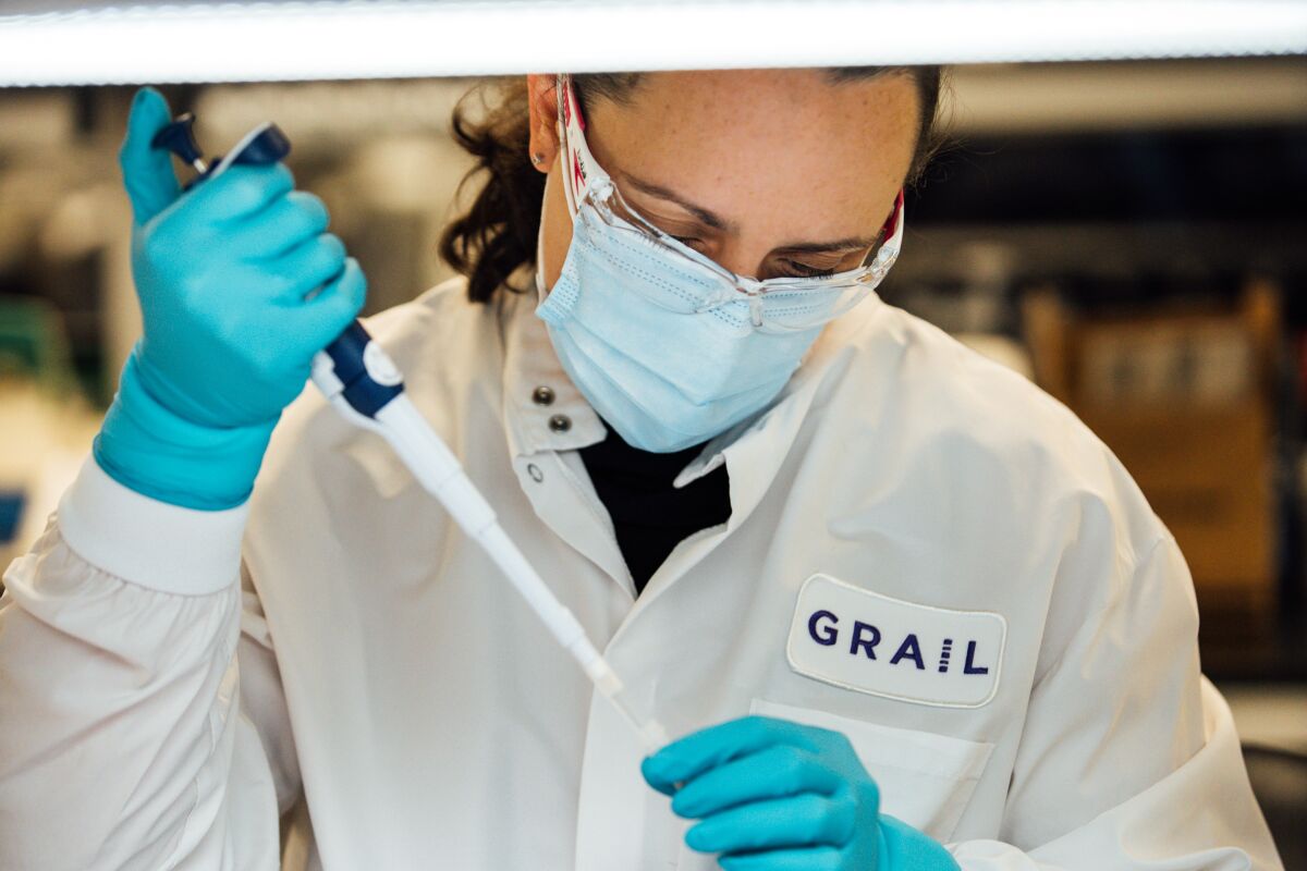 Scientists work in Grail's lab.