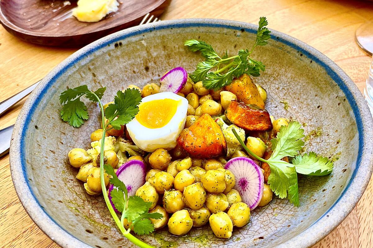 Spiced chickpea salad with roasted vegetables and radishes at Lulu restaurant inside L.A.'s Hammer Museum.