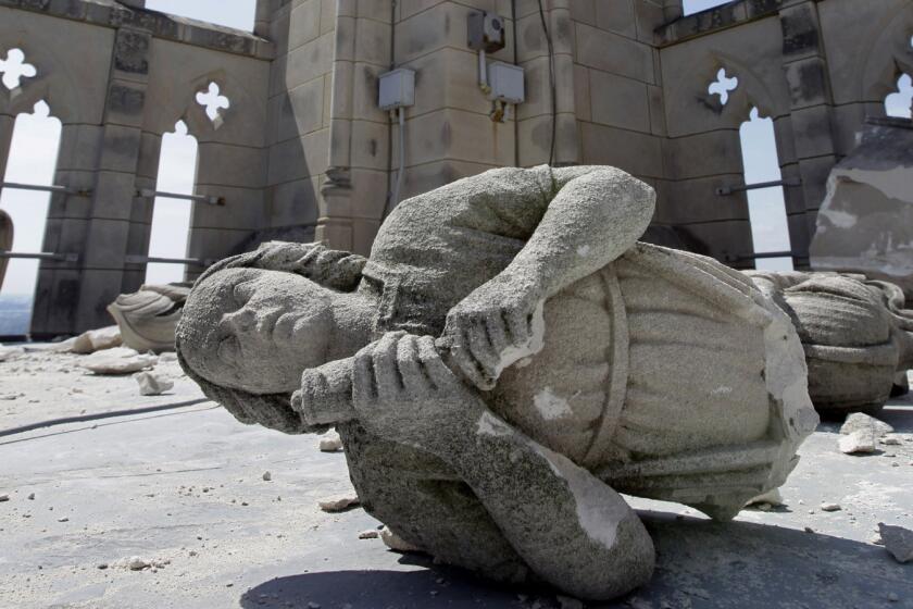 An angel carved from limestone lies shattered on the roof of the National Cathedral in Washington after a 2011 earthquake.