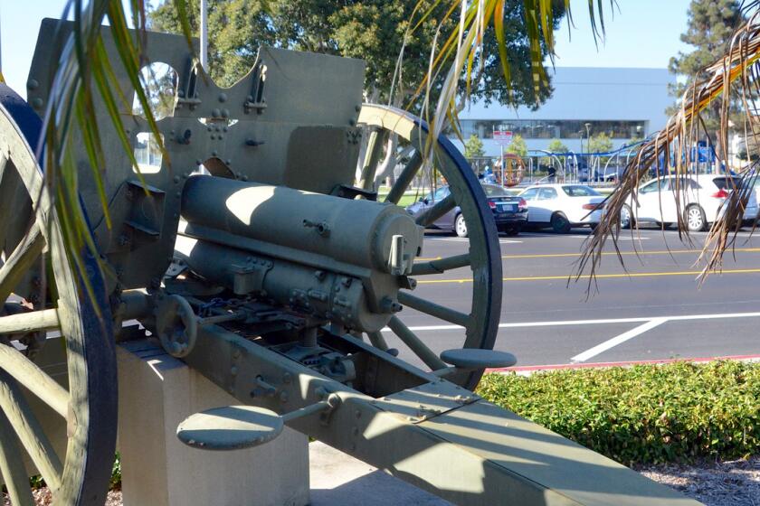 An 835 pound cannon with a seven foot barrel is actually an authentic M-1902 U.S. Army field gun used for training purposes during WW1. sits in front of the Costa Mesa Police substation on West 18th street and across from Lions Park. (Photo by Susan Hoffman)