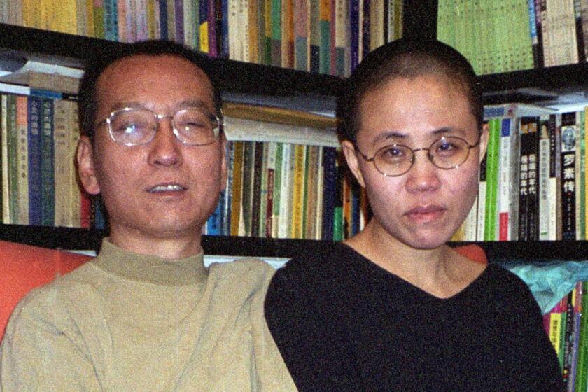 (FILES) This file handout photo released by the Liu family and taken on October 22, 2002 shows Chinese dissident and Nobel Peace laureate Liu Xiaobo (L) and his wife Liu Xia in Beijing. The liver function of China's Nobel Peace Prize laureate Liu Xiaobo "has deteriorated", the hospital treating him said on July 6, 2017, raising fears about his future. / AFP PHOTO / LIU FAMILY / Handout / - China OUT / -----EDITORS NOTE --- RESTRICTED TO EDITORIAL USE - MANDATORY CREDIT "AFP PHOTO / LIU FAMILY HANDOUT" - NO MARKETING - NO ADVERTISING CAMPAIGNS - DISTRIBUTED AS A SERVICE TO CLIENTS - NO ARCHIVESHANDOUT/AFP/Getty Images ** OUTS - ELSENT, FPG, CM - OUTS * NM, PH, VA if sourced by CT, LA or MoD **