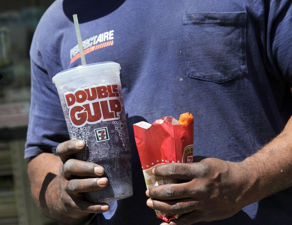 Selling giant sodas like this could soon be verboten at many New York businesses, but convenience stores such as 7-Eleven will be exempt. The New York branch of the NAACP argues the law discriminates against small businesses.