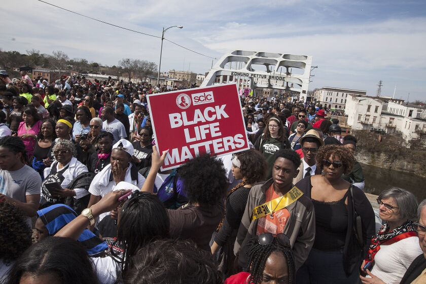 Marchers on the Edmund Pettus Bridge on March 8 in Selma.