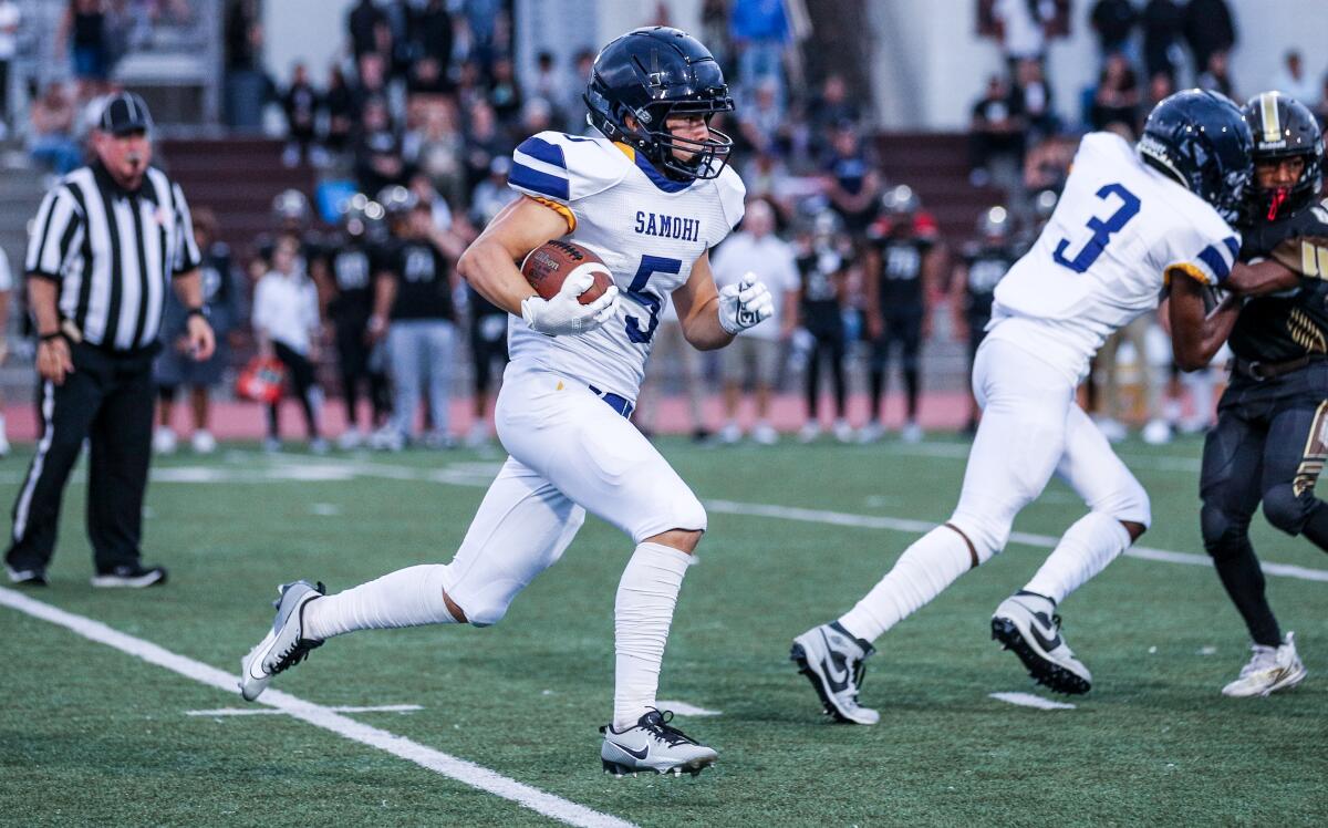 Caden McCallum of Santa Monica takes off on a run against West Torrance.