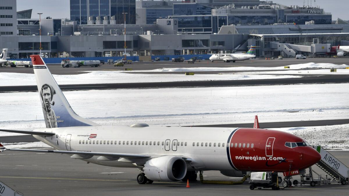 A grounded Norwegian Airlines Boeing 737 Max 8 is parked at Helsinki Vantaa airport in Finland on March 13.