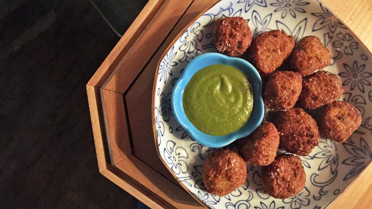 Be sure to sample the crab-and-jalapeno hush puppies with roasted jalapeno dipping sauce from Other Mama in Las Vegas.
