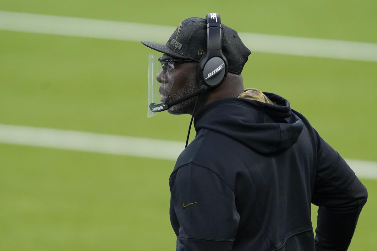 Chargers coach Anthony Lynn watches from the sideline.