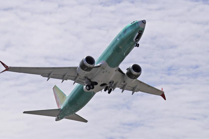 FILE - In this May 8, 2019, file photo, a Boeing 737 MAX 8 jetliner being built for Turkish Airlines takes off on a test flight in Renton, Wash. Boeing says it has finished with its updates to the flight-control software implicated in two deadly crashes involving its 737 Max, moving a step closer to getting the plane back in the sky. (AP Photo/Ted S. Warren, File)