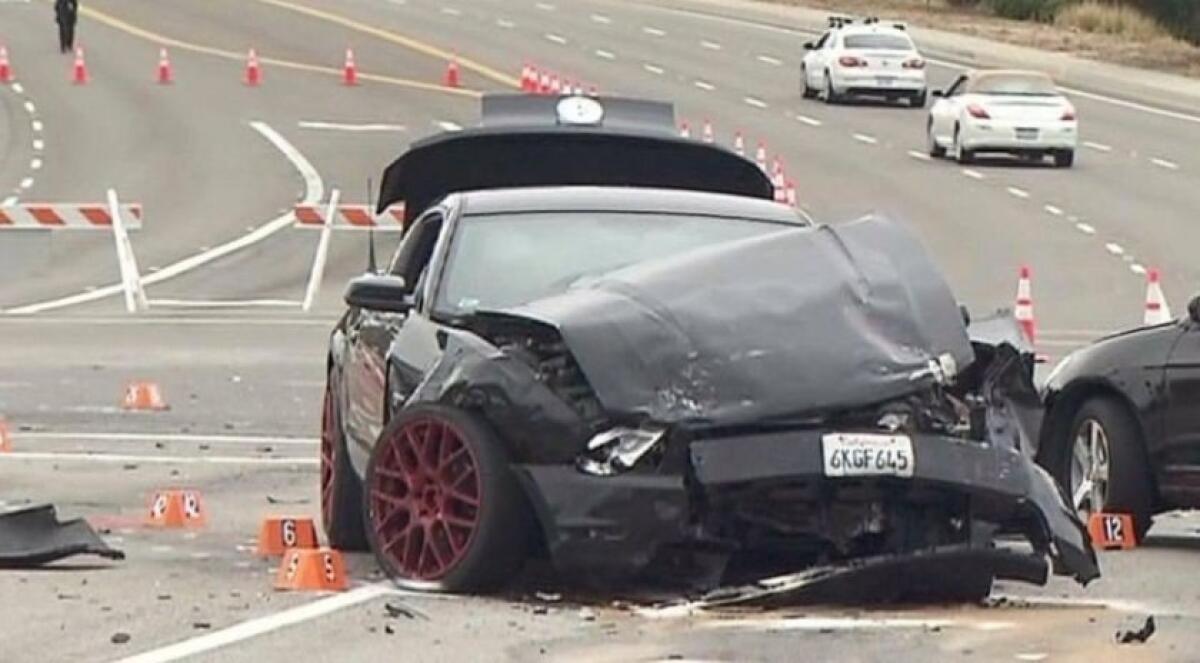 The scene of a crash in June 2015 in Irvine that killed a woman and her 2-year-old granddaughter. Alec Scott Abraham, 25, of Costa Mesa was convicted Tuesday of second-degree murder in the case.