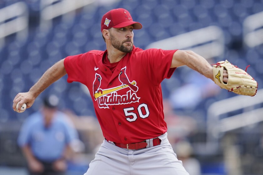St. Louis Cardinals starting pitcher Adam Wainwright (50) pitches in the first inning of a spring training baseball game against the Houston Astros, Wednesday, March 23, 2022, in West Palm Beach, Fla. (AP Photo/Sue Ogrocki)