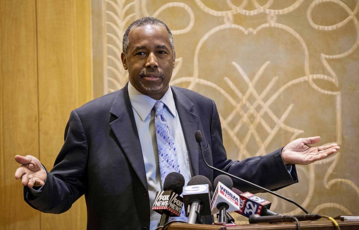 Republican presidential candidate Ben Carson takes questions from reporters Thursday at the Peninsula Hotel in Chicago.
