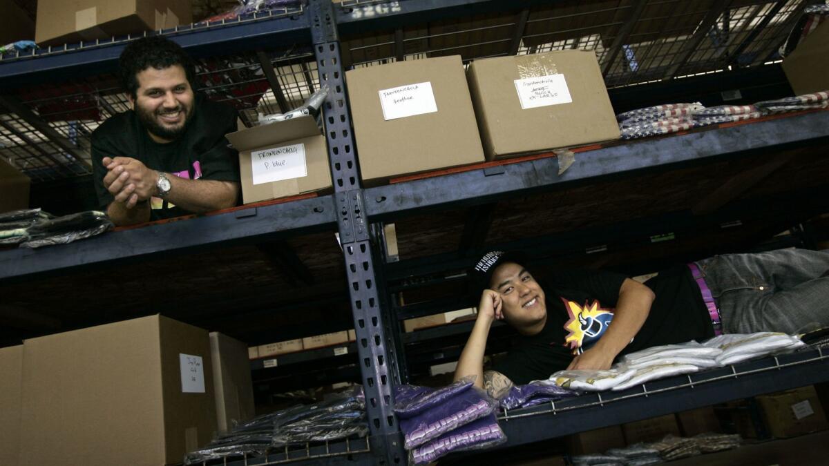 A May 18, 2009, photo from The Times archives of the Hundreds co-founders Ben Shenassafar, left, and Bobby Kim in their L.A. offices.