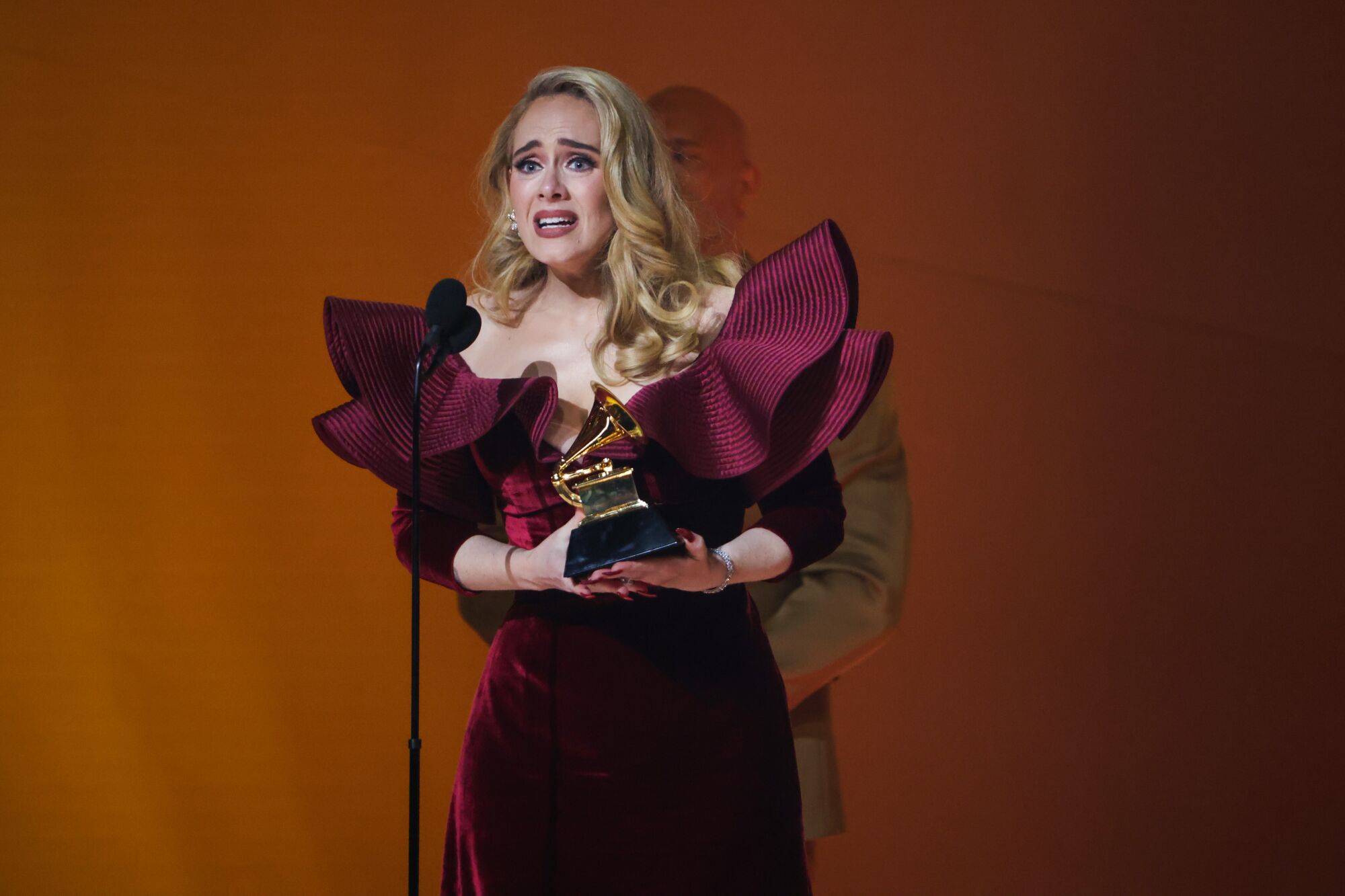 Adele accepts the Best Pop Solo Performance award for "Easy On Me" onstage during the 65th Grammy Awards.
