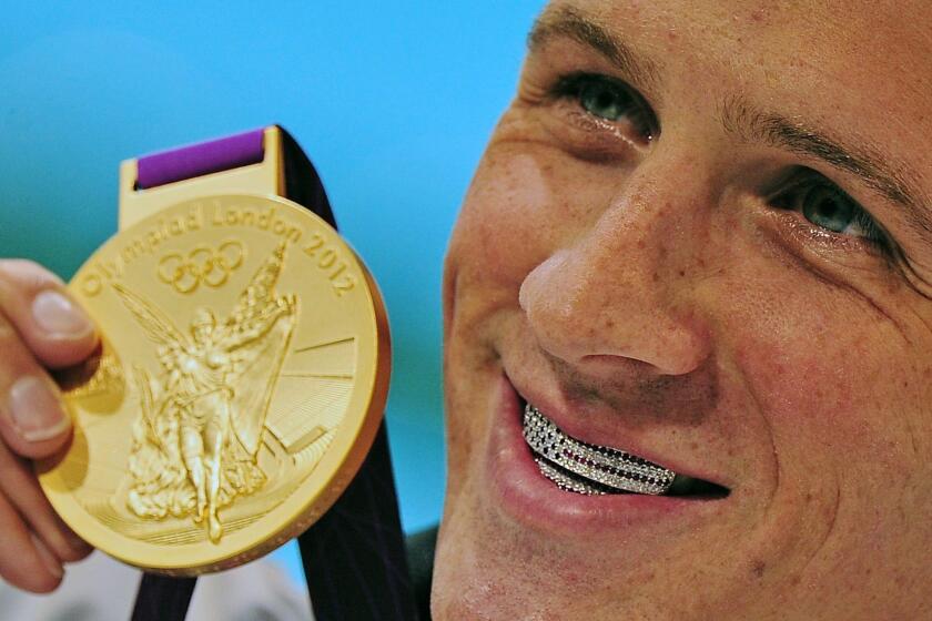 When American swimmer and fashion lover Ryan Lochte won his first gold medal, he stepped up to the podium and gave a big grin -- revealing a custom made jewel-encrusted American flag dental grill. The United States looked on, embarrassed. Lochte bared more than that when he was photographed on Vogue's June cover running arm in arm on a beach with fellow Olympians Serena Williams and Hope Solo, all clad in tasteful bathing suits. (June, July)