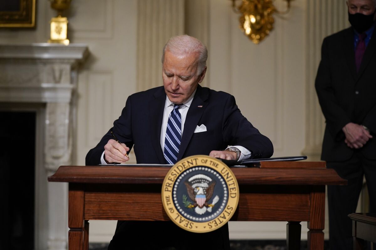 President Biden signs an executive order on climate change.