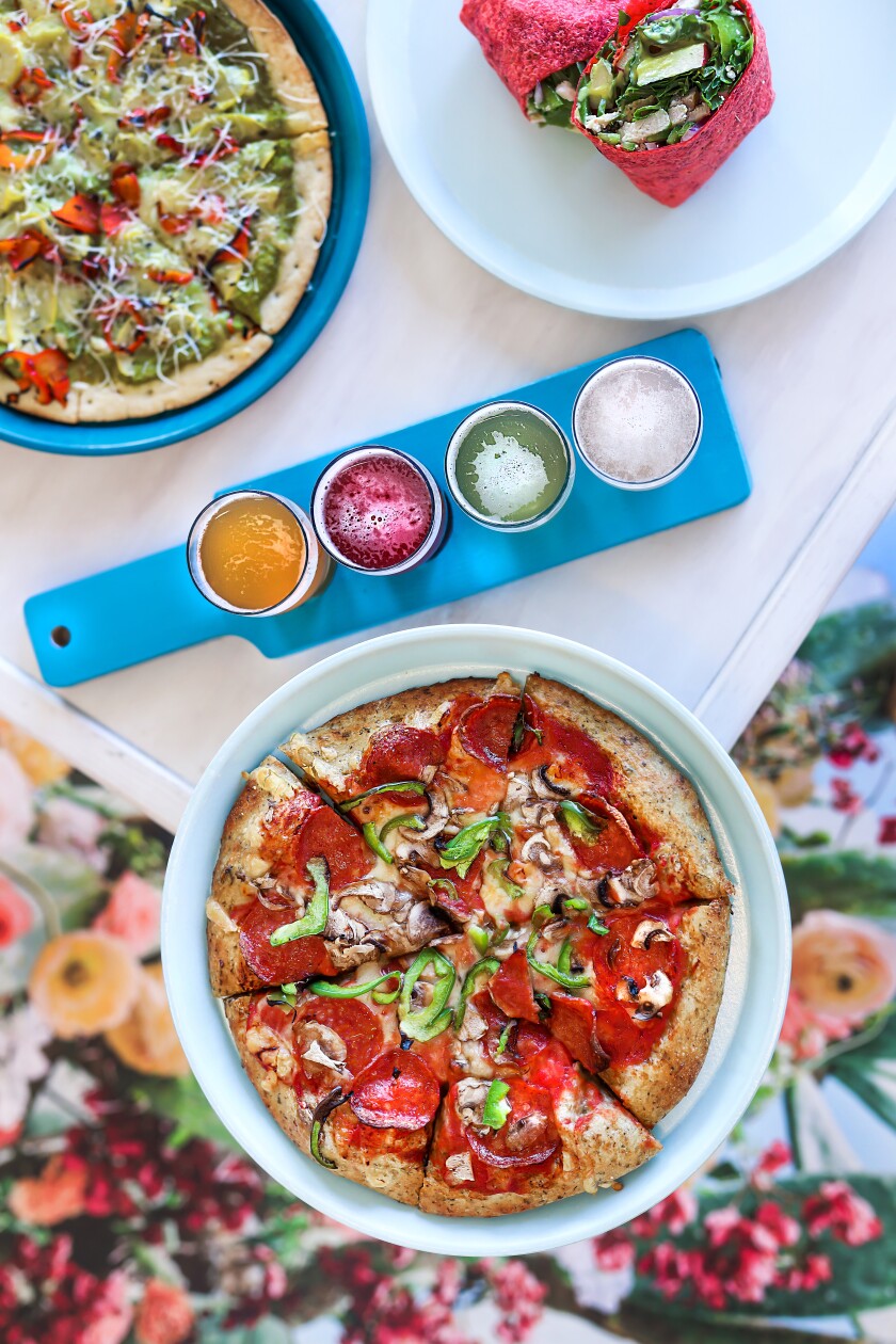 Powerhaus Wholesome Pizza & Eats serves up healthier-than-usual pizzas, wraps and various kombuchas on tap.