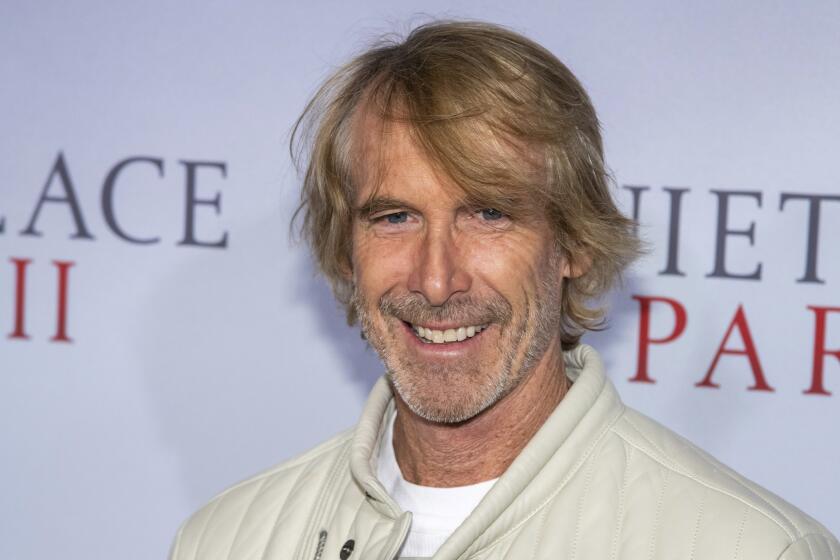 FILE - In this March 8, 2020 file photo, Michael Bay attends the world premiere of "A Quiet Place Part II" in New York. The union that represents film actors is telling its members not to work on the pandemic thriller “Songbird," one of the first films in production after coronavirus closures. The Screen Actors Guild-American Federation of Television and Radio Actors issued a do not work order Thursday, saying the filmmakers have not been transparent about safety protocols and had not signed the proper agreements with the union. The movie, produced by Michael Bay and directed by Adam Mason, had reportedly been preparing its actors remotely under locked down conditions for the shoot. (Photo by Charles Sykes/Invision/AP, File)