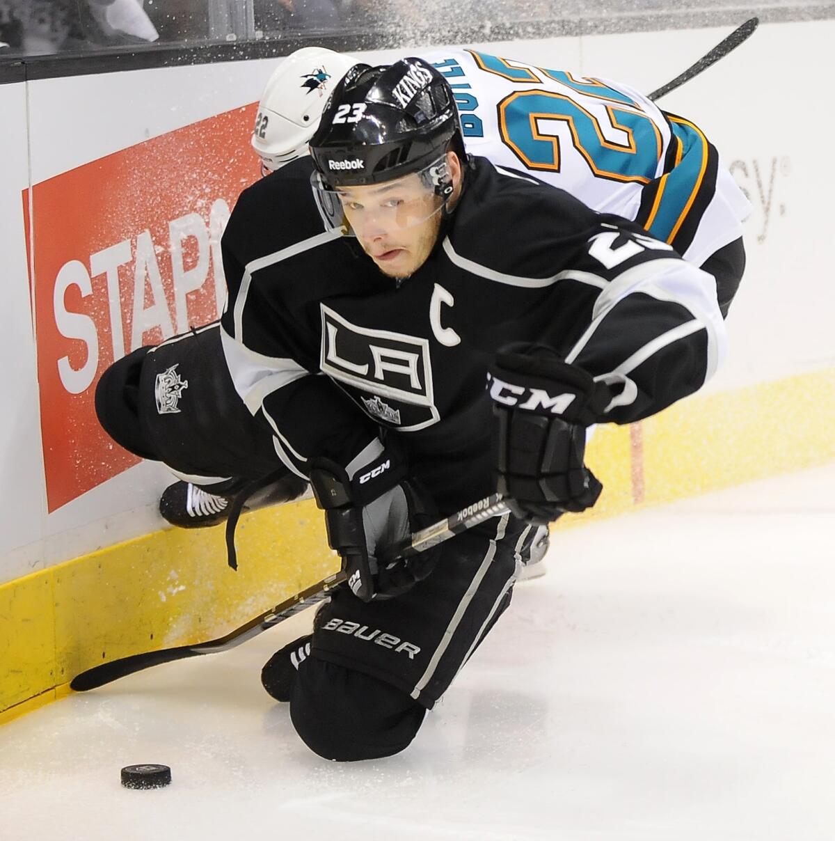 Kings captain Dustin Brown might not be healthy enough to play in the team's season opener against the Minnesota Wild on Oct. 3.
