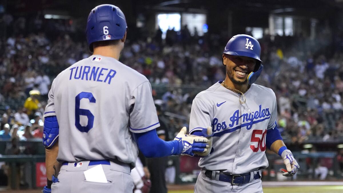 Gonsolin goes to 11-0, Dodgers get 4 HRs to beat Cubs 5-3
