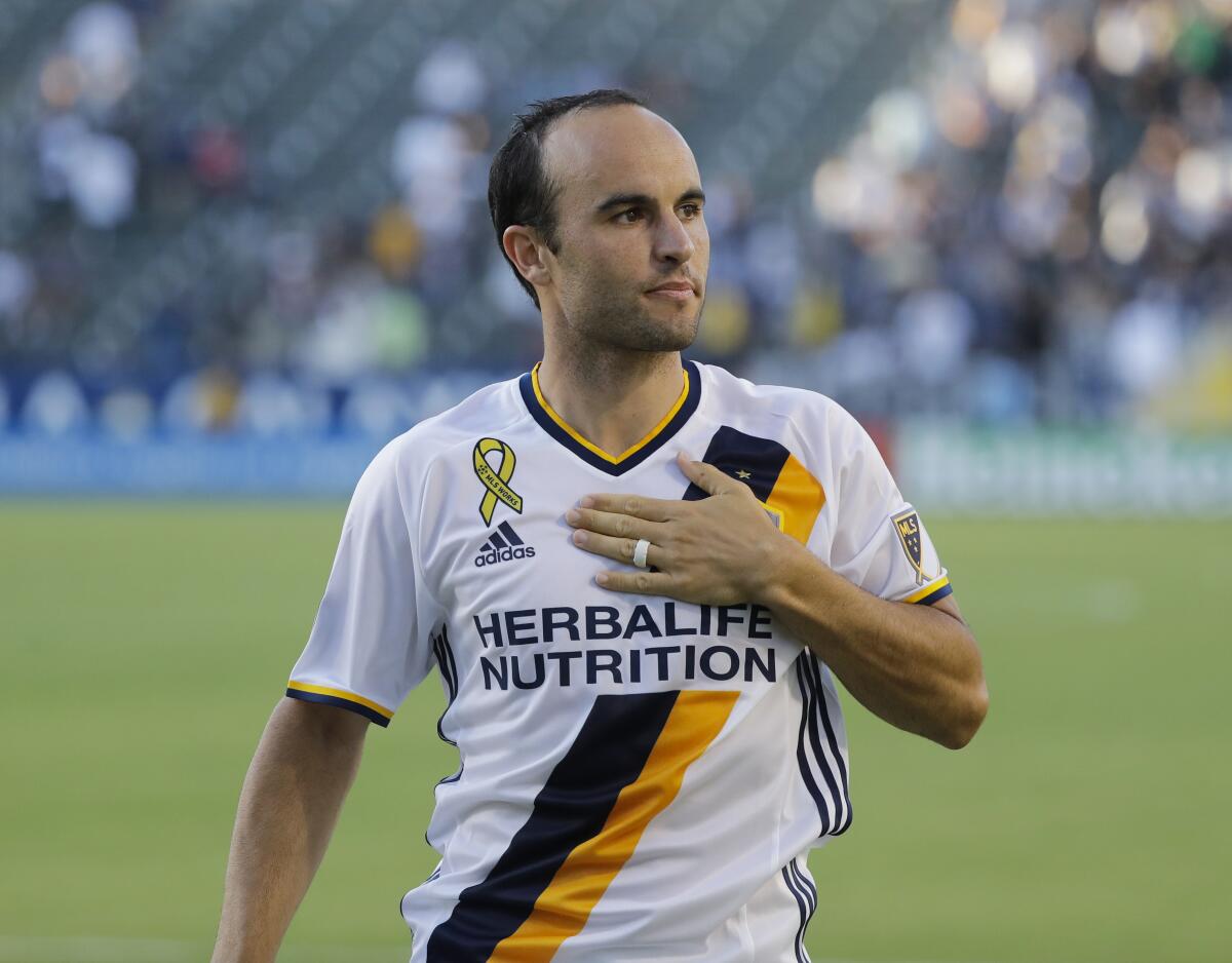 Former Galaxy star Landon Donovan acknowledges the crowd during a match in September 2016.