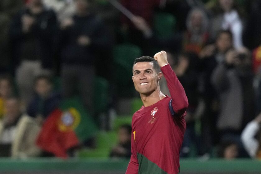 Portugal's Cristiano Ronaldo celebrates after scoring his side's fourth goal during the Euro 2024 group J qualifying soccer match between Portugal and Liechtenstein at the Jose Alvalade stadium in Lisbon, Portugal, Thursday, March 23, 2023. (AP Photo/Armando Franca)