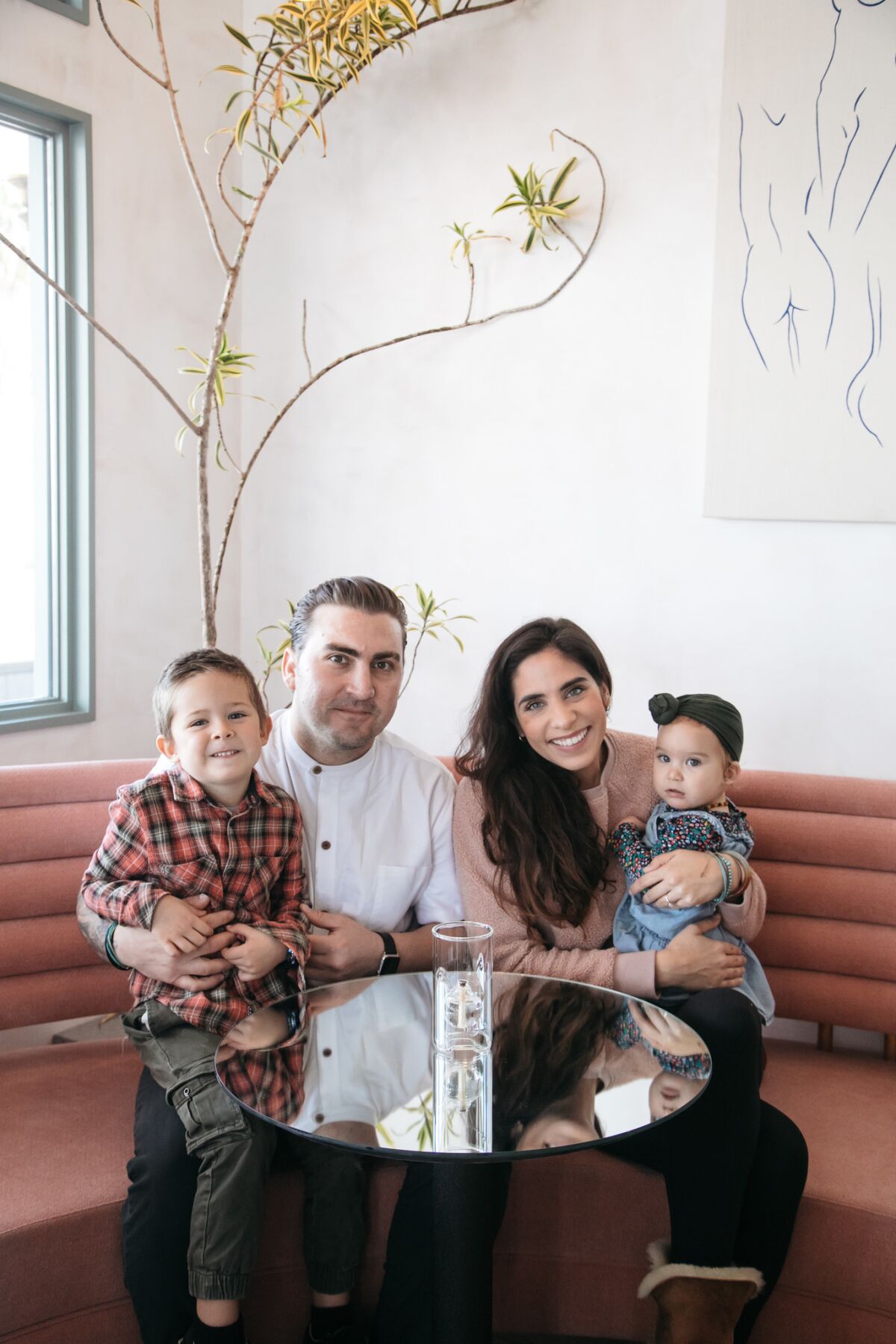Former Jeune et Jolie chef Andrew Bachelier in December 2018 with his fiancée Larah, and their children.