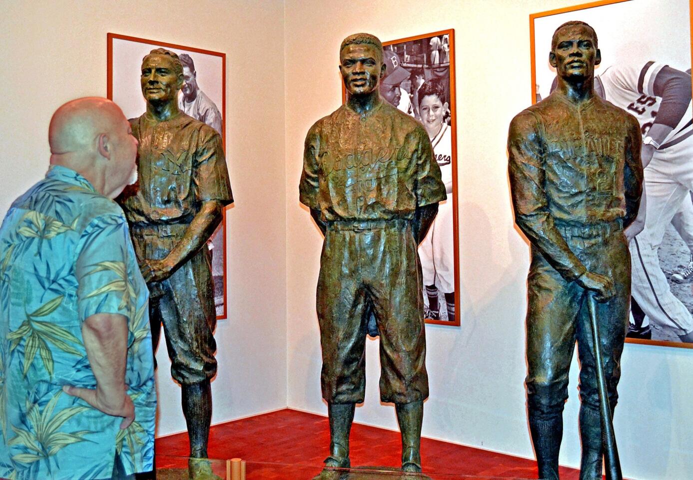 Lou Gehrig, Jackie Robinson and Roberto Clemente statues