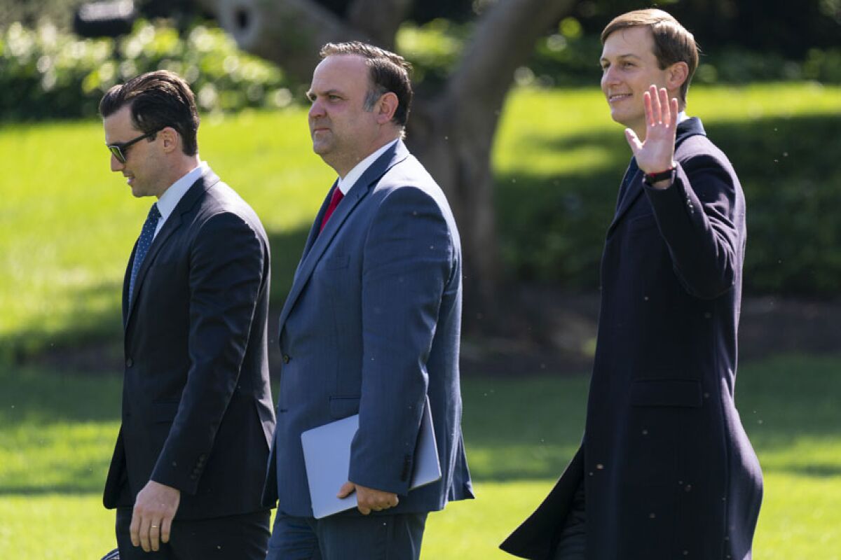 White House aide Nick Luna, from left, social media director Dan Scavino and Jared Kushner, Trump's son-in-law.