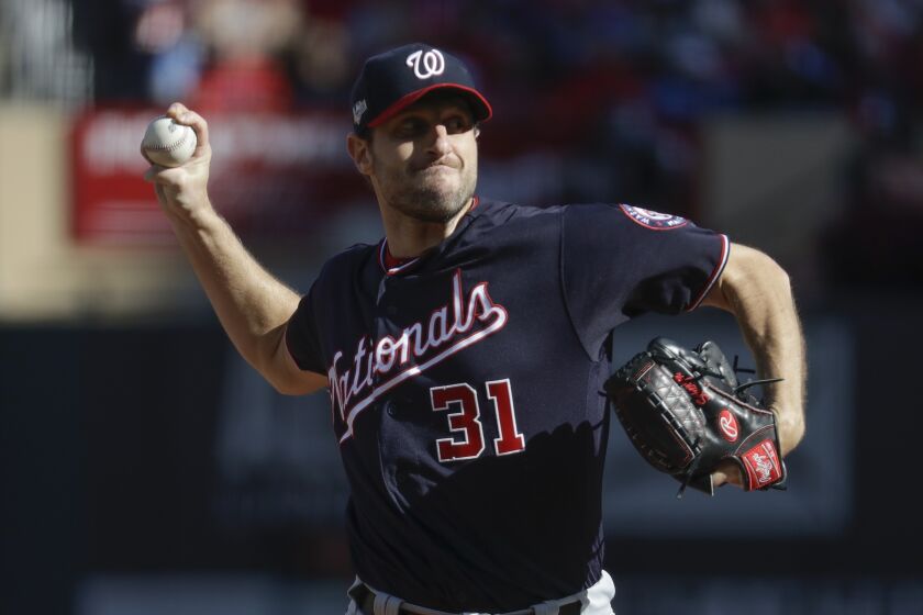 Washington Nationals starting pitcher Max Scherzer throws during the first inning of Game 2 of the baseball National League Championship Series against the St. Louis Cardinals Saturday, Oct. 12, 2019, in St. Louis. (AP Photo/Mark Humphrey)