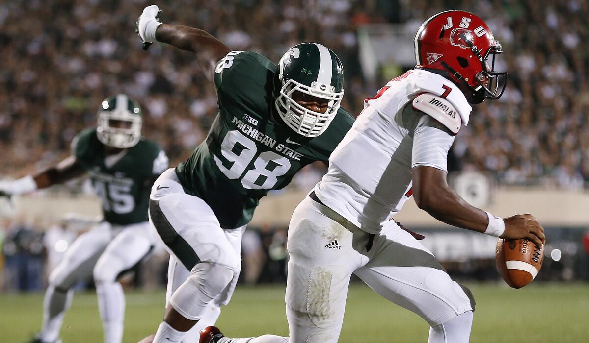 Michigan State and defensive end Demetrius Cooper, applying pressure against Jacksonville State quarterback Eli Jenkins last week, will try to slow down Oregon's vaunted offense in a powerhouse showdown Saturday.