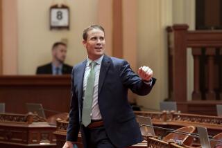 State Senate President Pro Tempore Designate Mike McGuire, of Healdsburg, greets other members lawmakers as he walks through the Senate Chambers at the Capitol in Sacramento, Calif., Monday, Jan. 8, 2024. McGuire will replace current Senate Pro Tempore Toni Atkins when he is sworn-in Monday Feb. 5, 2024. (AP Photo/Rich Pedroncelli)