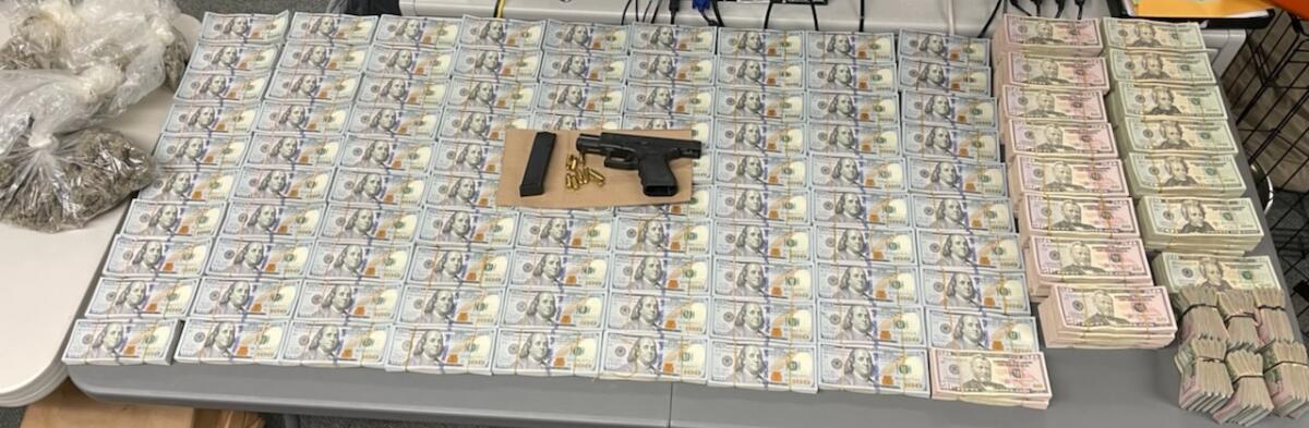 San Diego police released a photo of some of the $1.2 million seized Tuesday from a City Heights home.
