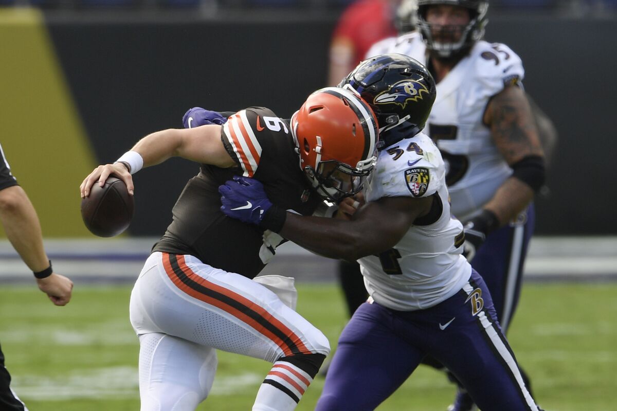 Baltimore Ravens linebacker Tyus Bowser (54) sacks Cleveland Browns quarterback Baker Mayfield (6), during the second half of an NFL football game, Sunday, Sept. 13, 2020, in Baltimore, MD. (AP Photo/Julio Cortez)