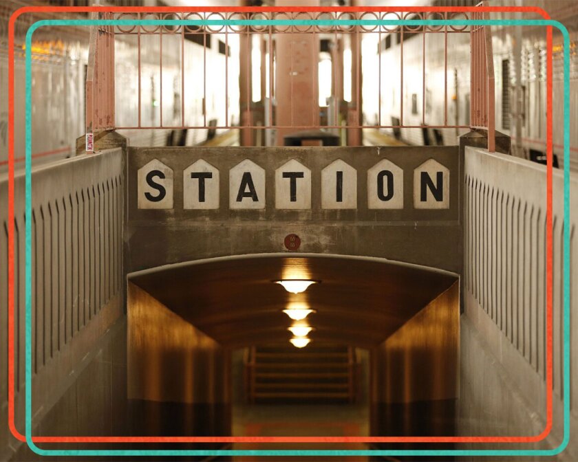"Station" is spelled out in capital letters, with a stairwell underneath.