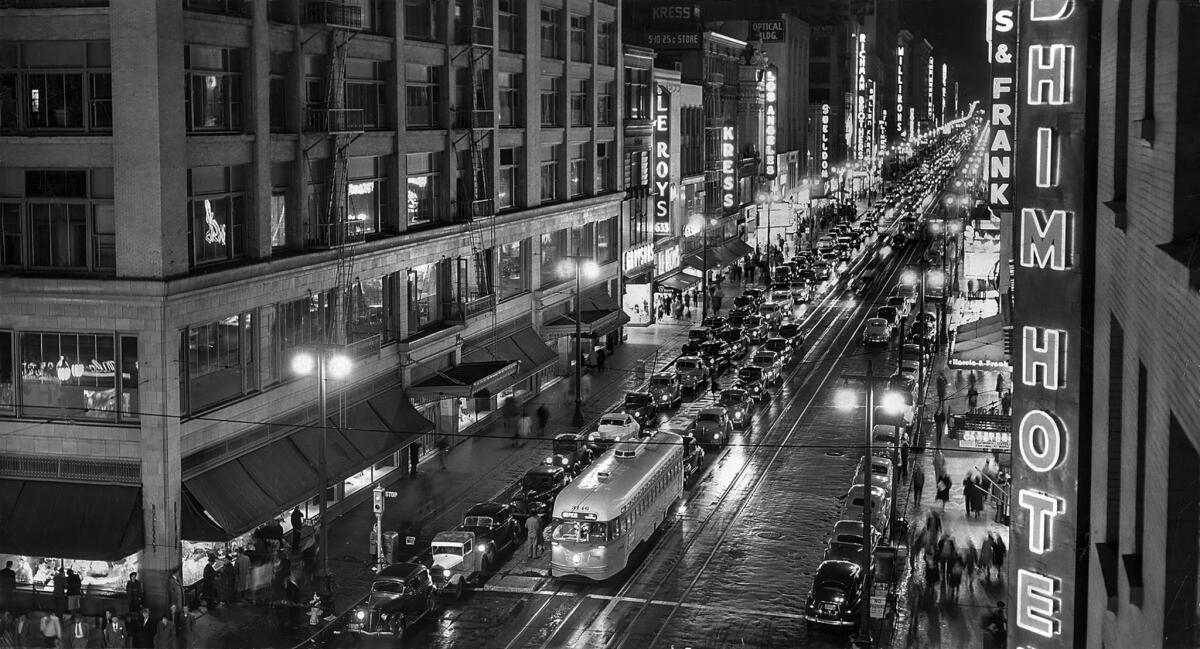 April 23, 1950: Night scene looking north on Broadway from 7th Street.