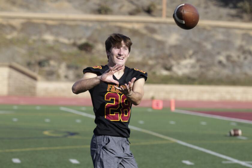 San Diego, CA - Oct 20, 2022: Torrey Pines High School football player Dylan Friedland catches a couple passes at the school before football practice October 20, 2022. (Bill Wechter / For The San Diego Union-Tribune)