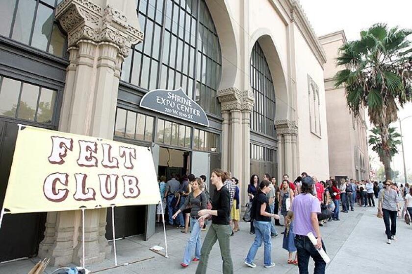 People queued up for the Felt Club craft show and sale Nov. 16 at L.A.'s Shrine Auditorium Expo Center. The economy may be tanking, but for Southern California's community of crafters, the future is looking surprisingly plush. The Felt Club show drew about 4,500 shoppers, who perused 144 booths jammed with homemade housewares, cute crocheted critters and stuffed felt cupcakes. The events success is just the latest proof that a long-simmering national movement continues to grow, and old-fashioned crafts are being revived in fresh ways among the under-40 set.