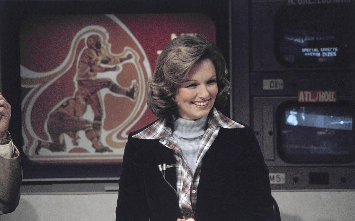 Phyllis George, a former Miss America who became a female sportscasting pioneer on CBS' “The NFL Today,” in 1976.