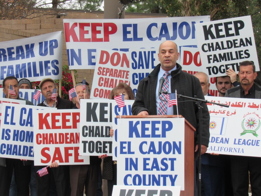 Mohammed Tuama, a Middle Eastern community leader, speaks at a rally in El Cajon against a new supervisorial districting map.