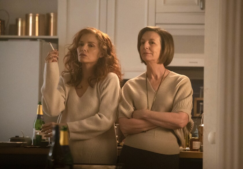 This image released by Sony Pictures Classics shows Michelle Pfeiffer, left, and Susan Coyne in a scene from "French Exit." (Jerome Prebois/Sony Pictures Classics via AP)