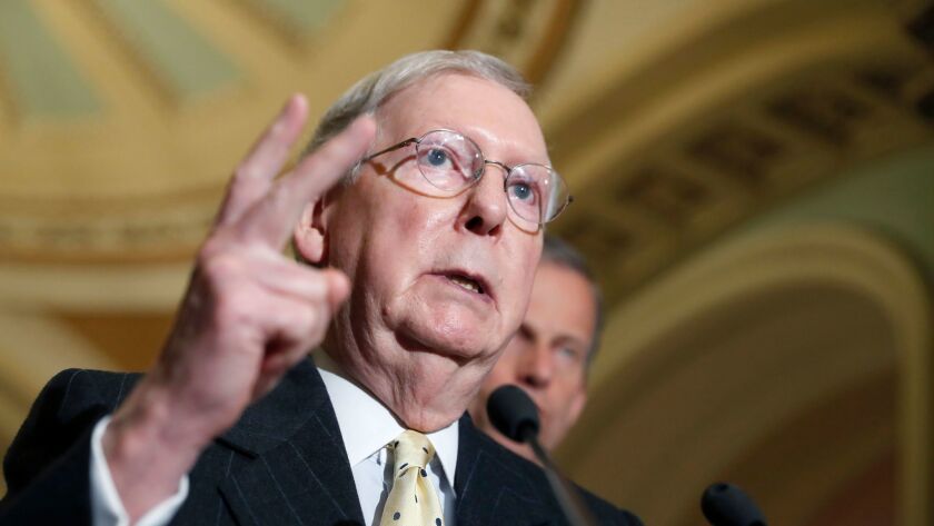 Senate Majority Leader Mitch McConnell speaks during a news conference on Capitol Hill in Washington.