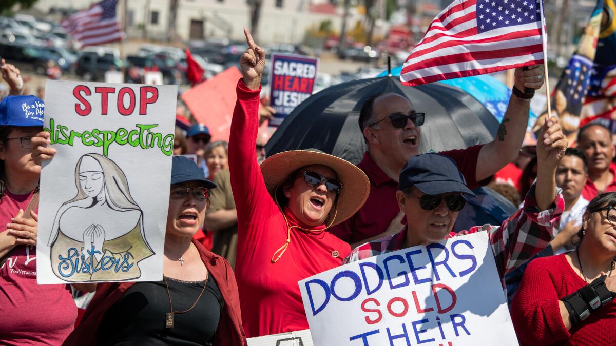 Catholic and other religious protesters gather at Dodger Stadium