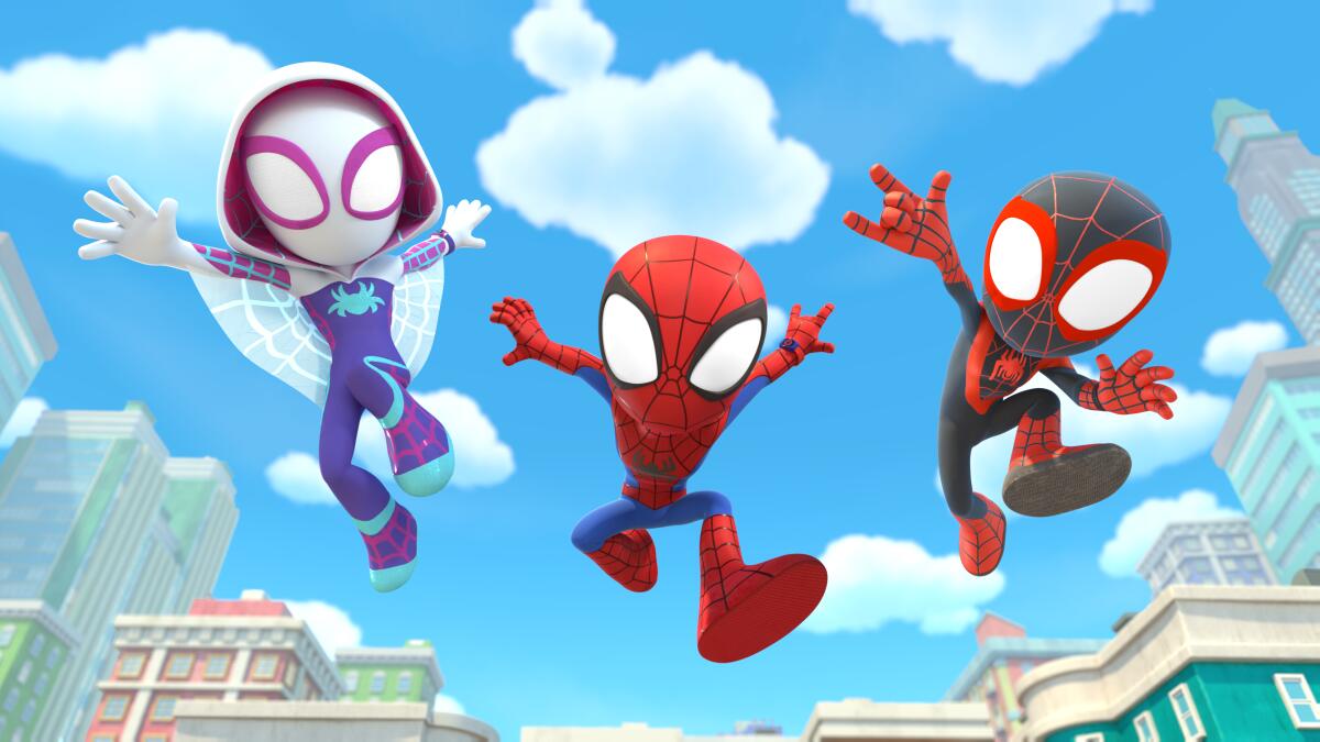 Three cartoon superheroes jump through the air.