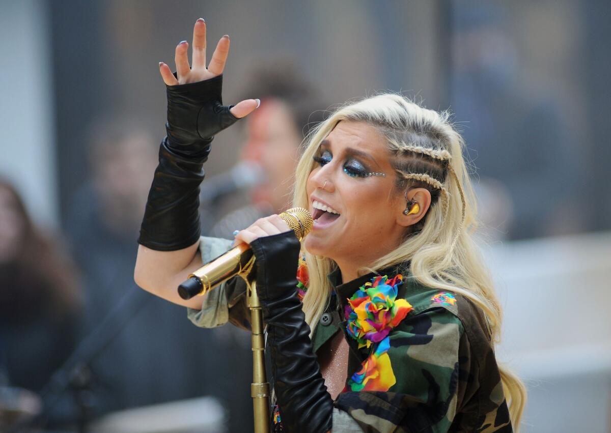 Pop star Kesha discusses her look and her rehab stint in the August 2014 issue of Teen Vogue.