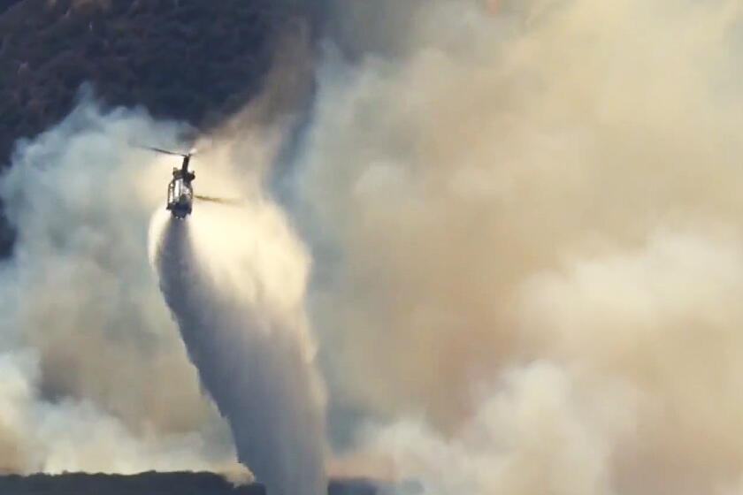Hawk Fire Reno Hawk fire burns 13,000 acres near Reno, prompting evacuations - Los ...