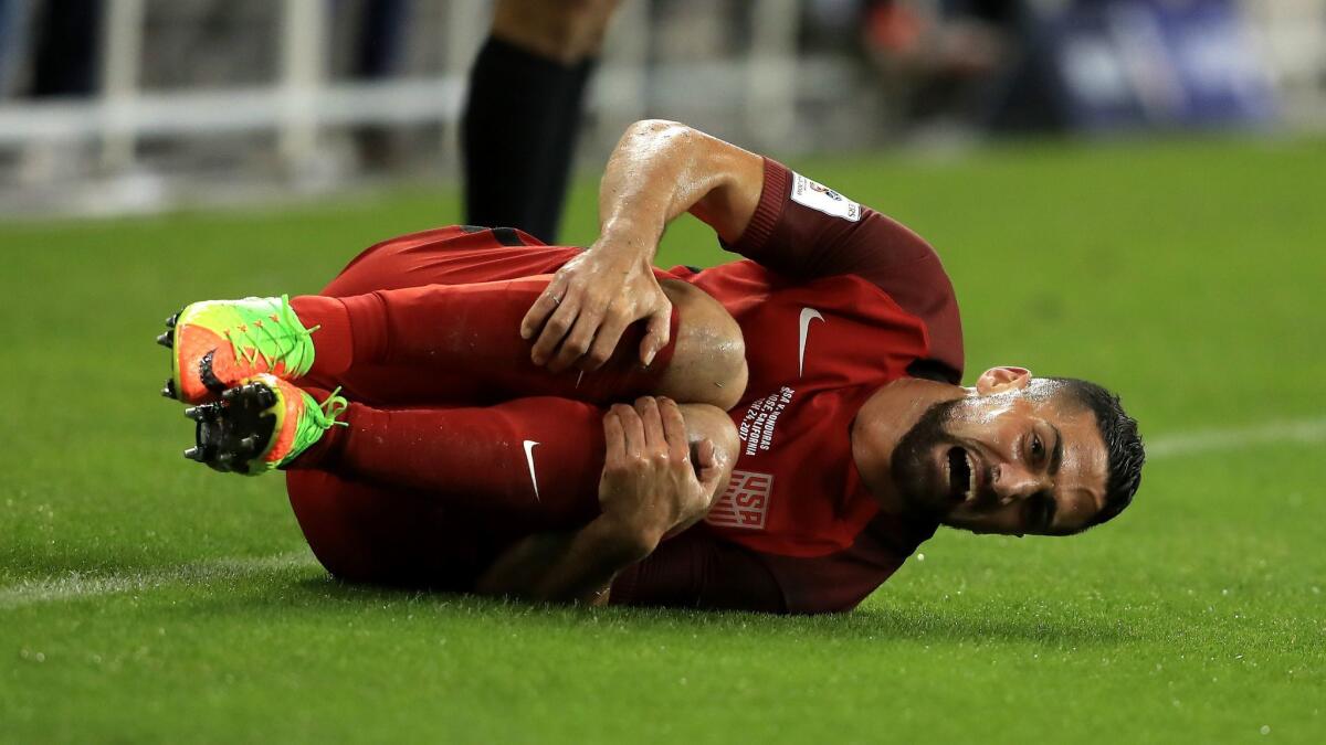 Sebastian Lletget reacts after being injured in the United States' win over Honduras in a World Cup qualifier last week.