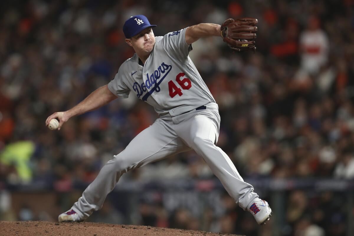 Los Angeles Dodgers' Corey Knebel pitches against the San Francisco Giants.