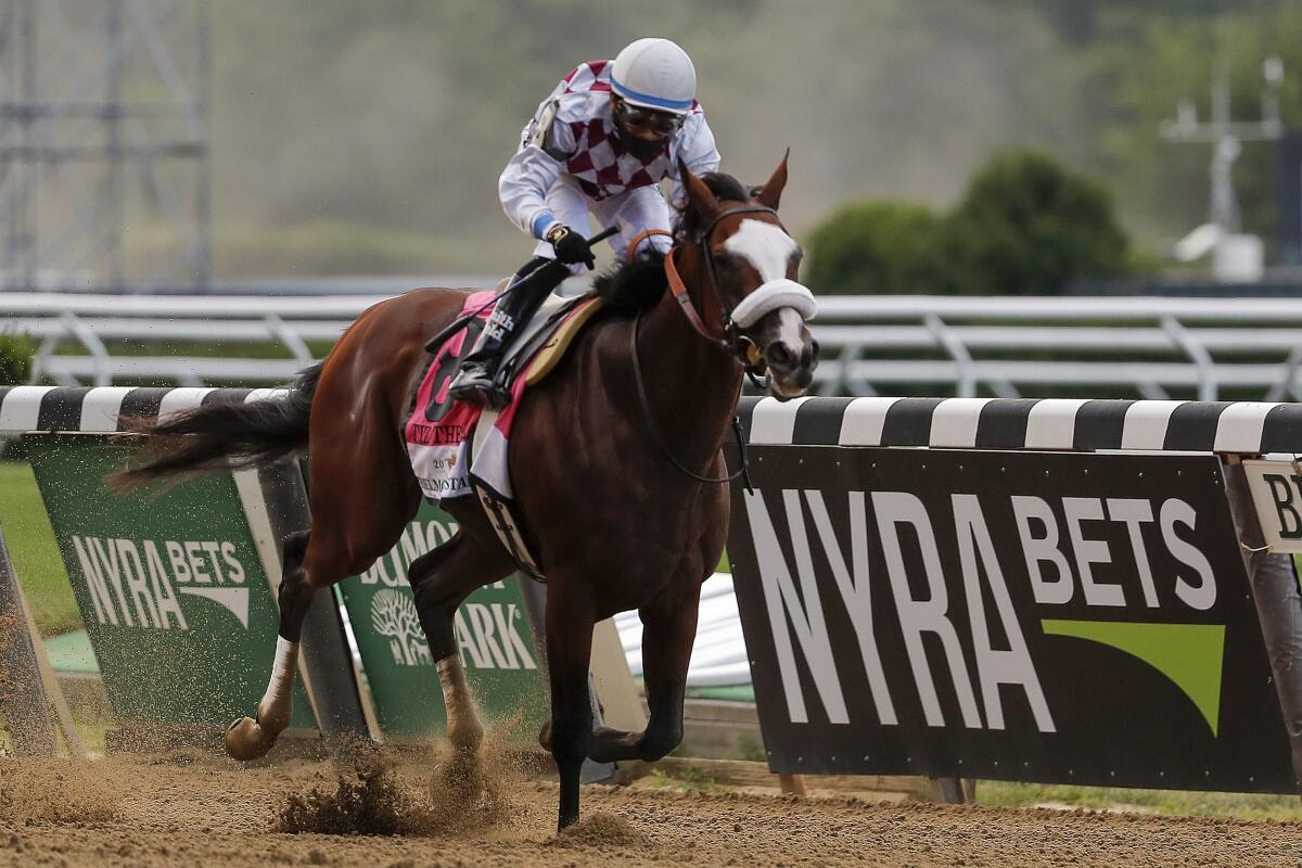 Tiz The Law, with jockey Manny Franco, won the Belmont Stakes.